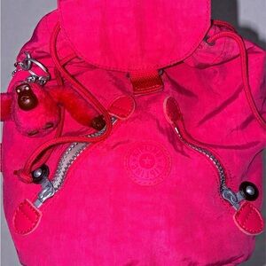 Kipling Fuchsia mini Backpack with Monkey Charm